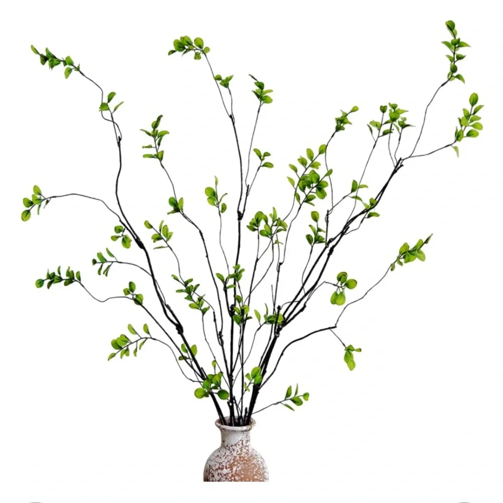 Lush Green Faux Plant in Artistic Vase